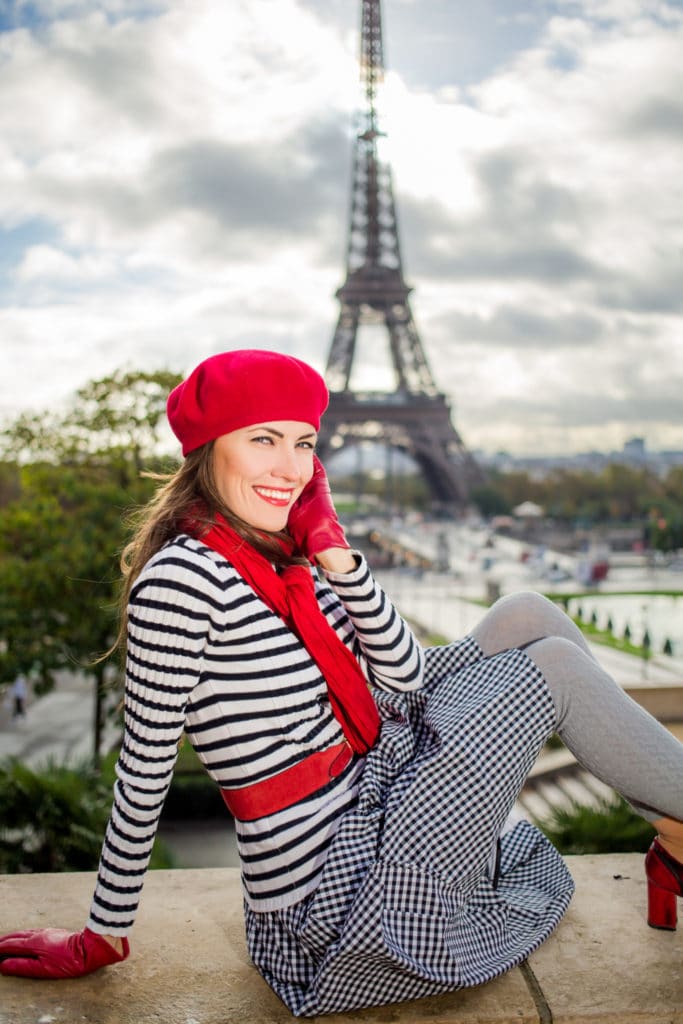 Young Woman With Red Beret By Eiffel Tower